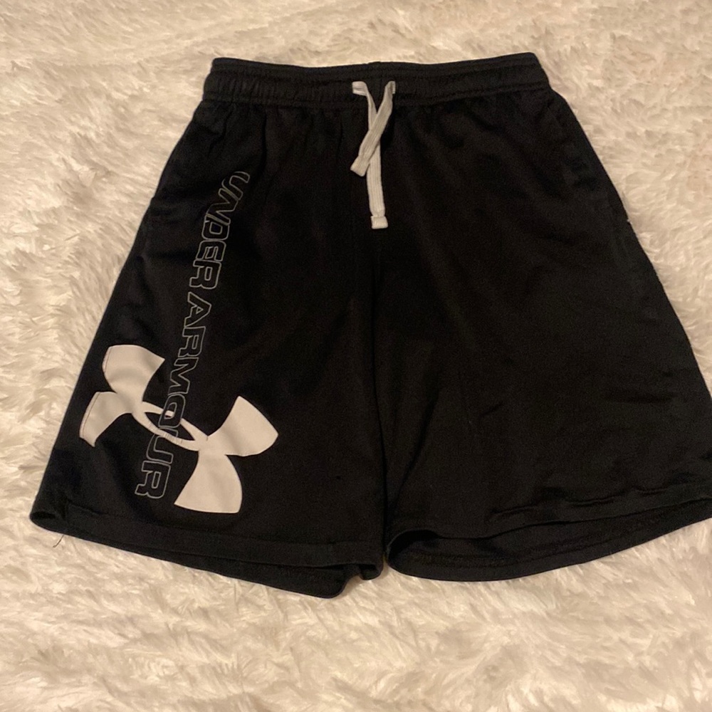 Boys black under armor shorts size M. Smoke free home